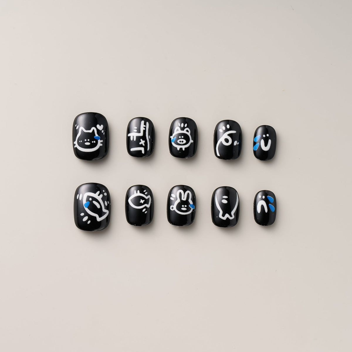 Kawaii Doodle Noir-short press-on nails from NailPop